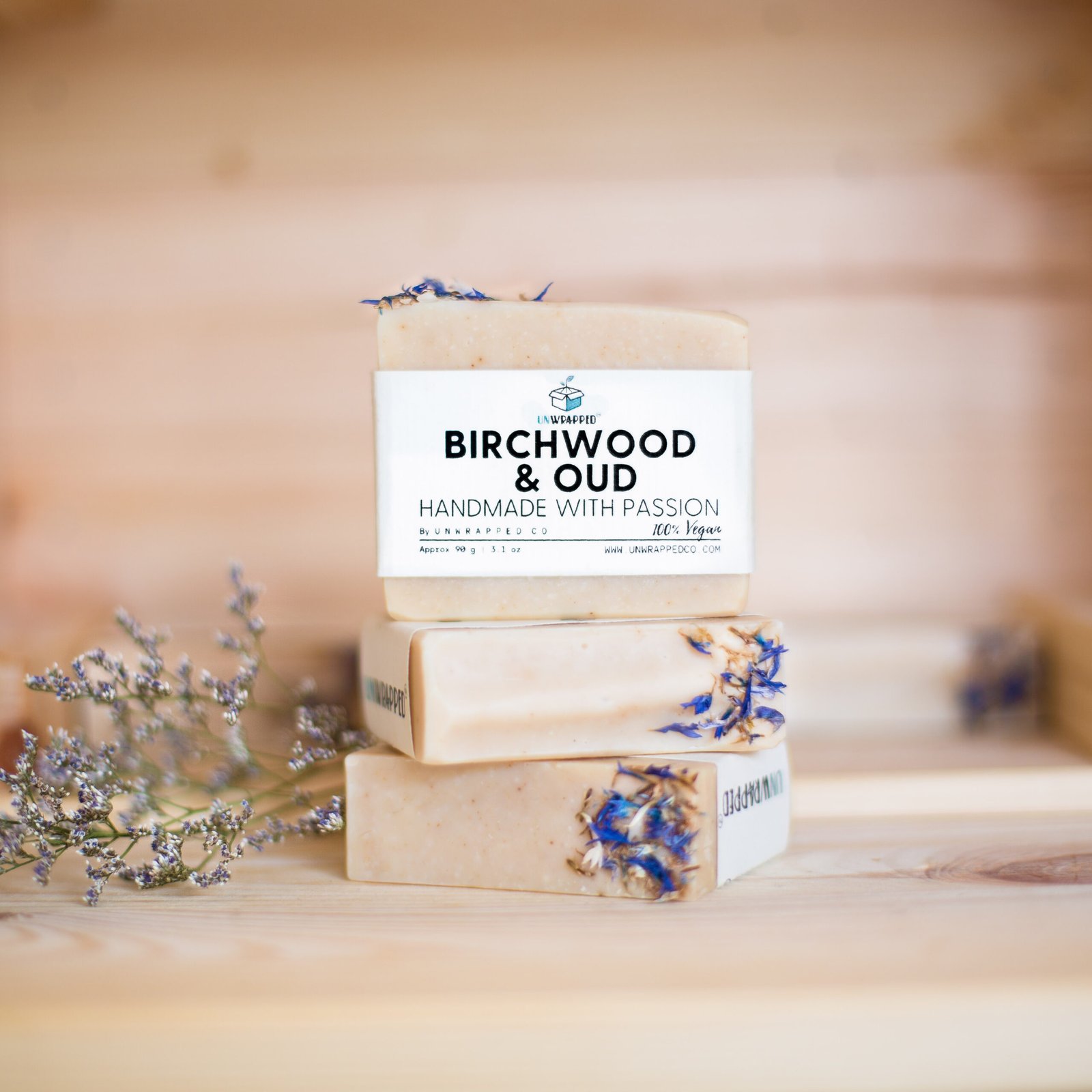 Unwrapped birchwood and oud soap bars