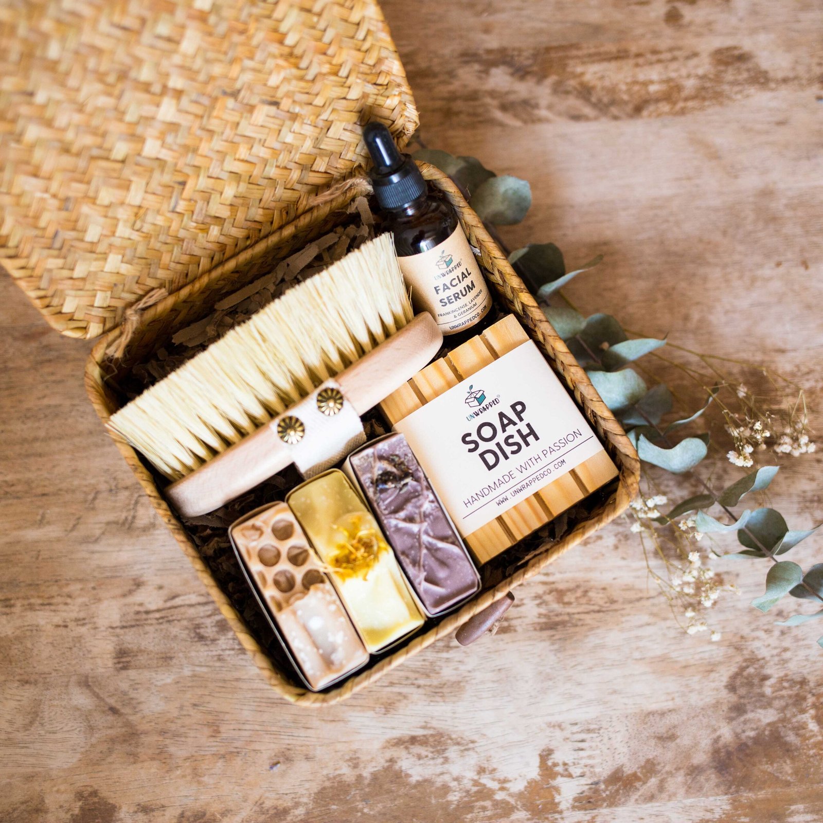 Unwrapped get your glow for her with facial serum, dry brush, soap dish and three soap bars