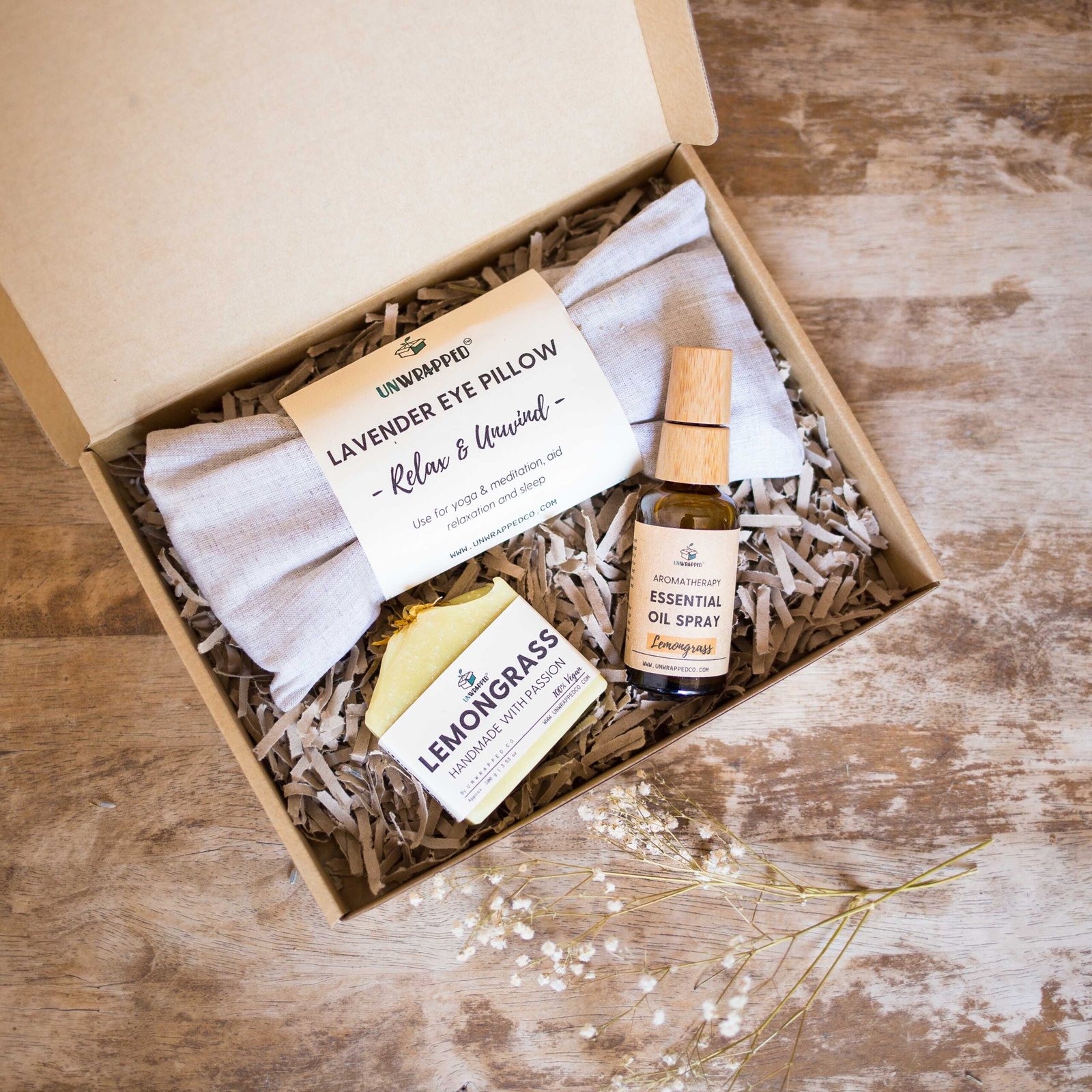 Unwrapped relaxation gift set with lavender eye pillow, lemongrass soap bar and lemongrass essential oil spray