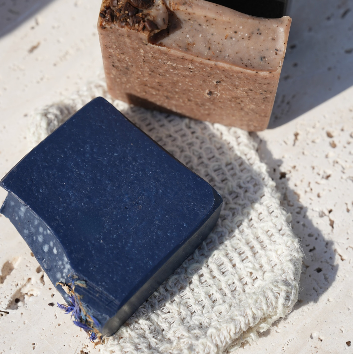 Unwrapped soap bars and sisal soap bar