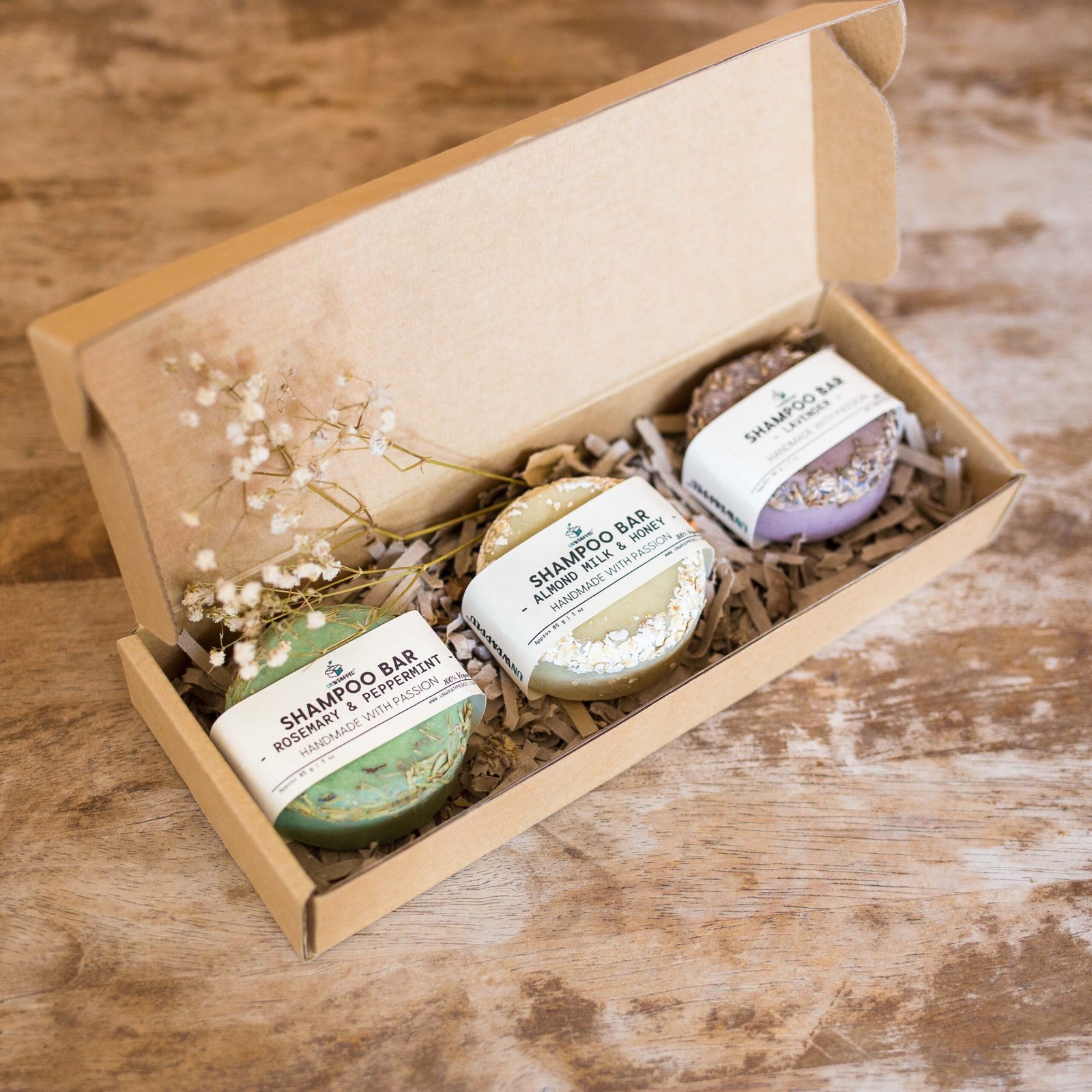 Unwrapped set of three shampoo bars